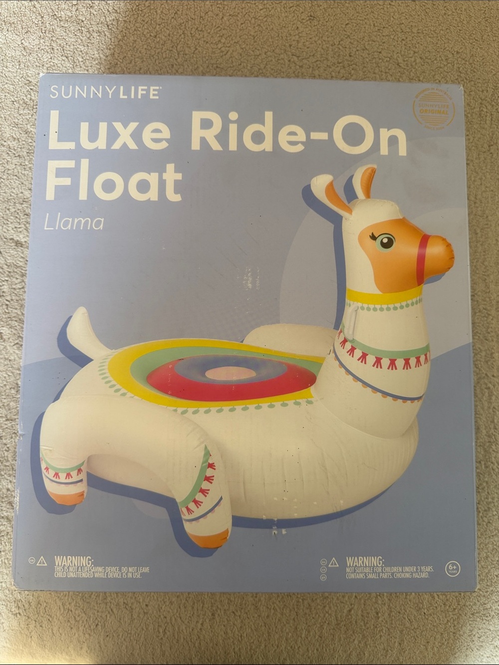 Sunnylife White Llama Luxe Ride-On Float with Yellow, Pink and Blue Accents